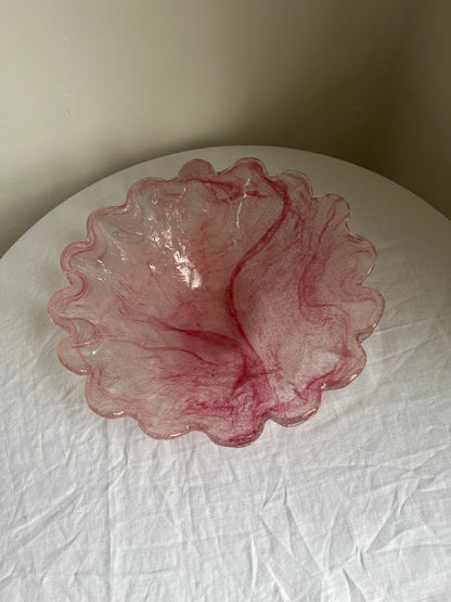 Large glass scalloped edge bowl with pink marbling