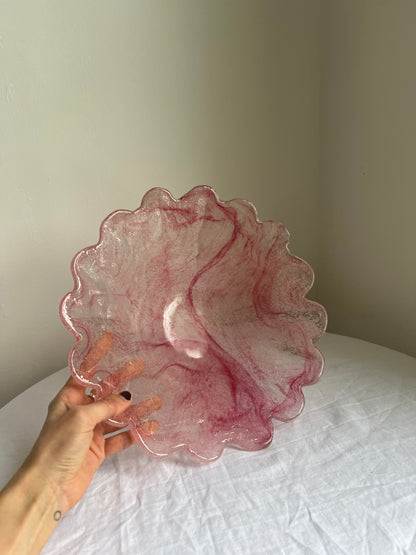 Large glass scalloped edge bowl with pink marbling