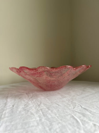 Large glass scalloped edge bowl with pink marbling