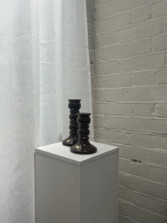 PAIR OF GLOSSY BROWN CANDLE STICKS